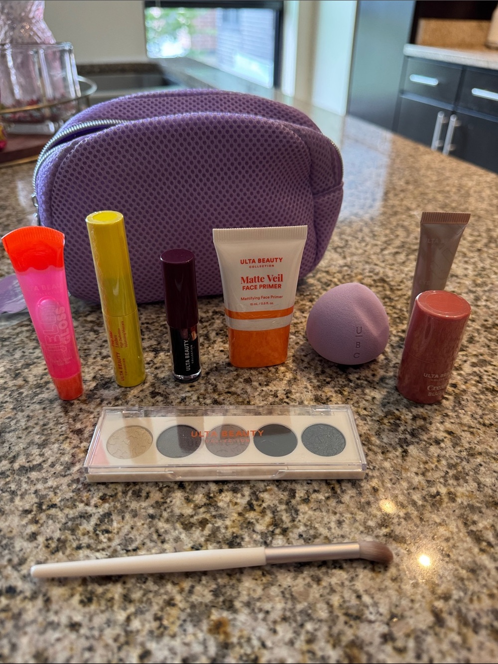 Ulta Beauty Purple Makeup Bag with variety of minis